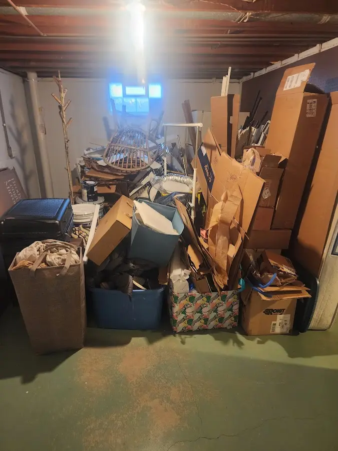 Roll-off dumpster container at job site for Construction Dumpster Rental in Tecumseh